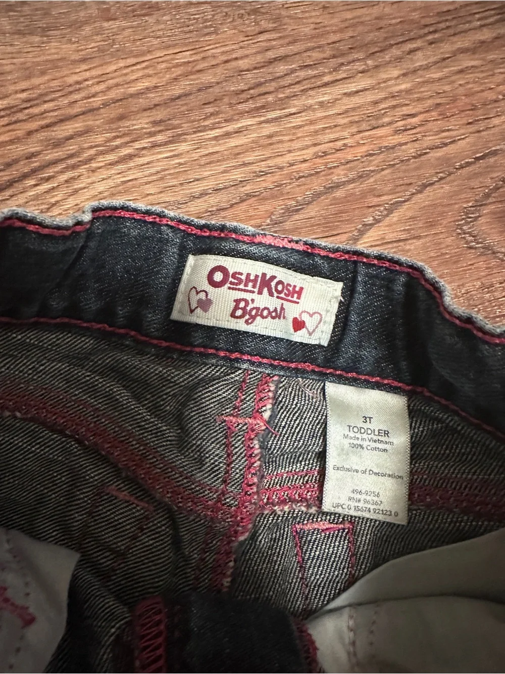 OshKosh B'gosh Dark Wash Jeans with Floral Embroidery and Pink Accents
